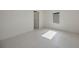 Bright bedroom featuring tile floors, and natural light from the window at 2590 Floyd St, Sarasota, FL 34239
