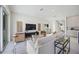 Contemporary living room with neutral tones, stylish decor, and access to other living areas in the home at 2590 Floyd St, Sarasota, FL 34239