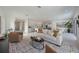 Open-concept living space offers seamless flow between living room, kitchen, and dining area, perfect for entertaining at 2590 Floyd St, Sarasota, FL 34239