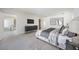 Bright main bedroom showcasing sleek furniture, calming colors, and an inviting layout at 2590 Floyd St, Sarasota, FL 34239