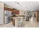 Spacious kitchen with stainless steel appliances and granite countertops offers seamless living space at 27243 Ipswich Dr, Englewood, FL 34223