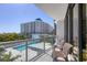 Balcony seating with pool views at 300 S Pineapple Ave # 302, Sarasota, FL 34236