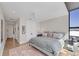 Well-lit bedroom featuring a ceiling fan, and a patterned rug at 300 S Pineapple Ave # 302, Sarasota, FL 34236