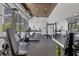 Well-equipped gym with treadmills, weights, and mirrors, offering a complete fitness experience at 300 S Pineapple Ave # 302, Sarasota, FL 34236