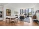 Bright living room featuring hardwood floors, a modern decor and large windows with a view at 300 S Pineapple Ave # 302, Sarasota, FL 34236