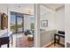 Open-concept layout with living area, office space, and ample natural light at 300 S Pineapple Ave # 302, Sarasota, FL 34236