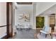 Bright lobby featuring stylish seating and an eye-catching living moss wall at 300 S Pineapple Ave # 302, Sarasota, FL 34236