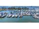 Waterfront marina view featuring an array of docked boats and yachts on a sunny day at 300 S Pineapple Ave # 302, Sarasota, FL 34236