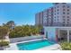 Rooftop pool with clear water, offering beautiful views and a refreshing retreat at 300 S Pineapple Ave # 302, Sarasota, FL 34236
