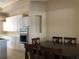 Open kitchen with modern appliances, white cabinets and ample counter space at 3405 54Th W Dr # 104, Bradenton, FL 34210