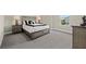 Bedroom featuring a neutral color scheme, a large window, and coordinated nightstands at 3415 Big Sky Way, Bradenton, FL 34211