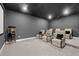 Home theater room with comfortable seating and a popcorn machine at 3415 Big Sky Way, Bradenton, FL 34211