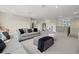Spacious living room with neutral tones and a comfortable seating area at 3415 Big Sky Way, Bradenton, FL 34211