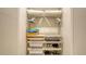 Organized closet space with shelves, hanging rods, drawers, and compartments for shoes and accessories at 3605 Quail Hollow Ln, Bradenton, FL 34210