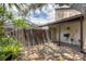 Private front courtyard with stone landscaping, patio, and a welcoming entrance at 3955 Glen Oaks Manor Dr, Sarasota, FL 34232