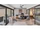 Modern office with large windows providing plenty of natural light with access to an outdoor patio at 3955 Glen Oaks Manor Dr, Sarasota, FL 34232