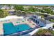 A stunning aerial view of the community pool, deck, and recreation area at 4211 Kingsfield Dr, Parrish, FL 34219