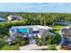 Aerial view of a community pool, cabana and landscaped grounds at 4211 Kingsfield Dr, Parrish, FL 34219