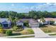 Attractive single-story home with a manicured lawn, two-car garage and mature landscaping at 4211 Kingsfield Dr, Parrish, FL 34219