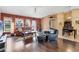 Inviting living room with hardwood floors, comfortable seating, and ample natural light at 4211 Kingsfield Dr, Parrish, FL 34219