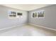 Bright bedroom with large windows and a window A/C unit at 4229 Alna Way, Sarasota, FL 34232