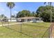 Quaint home with covered entryway and a fenced front yard at 4229 Alna Way, Sarasota, FL 34232