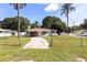 Charming home with a covered entryway, driveway, and fenced yard at 4229 Alna Way, Sarasota, FL 34232