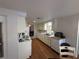 Classic kitchen featuring wood floors, dishwasher, and oven at 4411 Dolphin Ln, Palmetto, FL 34221