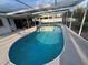 A beautiful private pool with a clear blue water, perfect for relaxation and enjoyment at 4411 Dolphin Ln, Palmetto, FL 34221