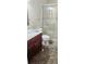 Bathroom featuring glass enclosed shower and granite vanity at 4415 45Th W Ave # 203, Bradenton, FL 34210