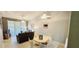 Spacious living and dining area featuring neutral-toned walls, tile floors, and ample natural light at 4415 45Th W Ave # 203, Bradenton, FL 34210
