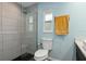 A bathroom featuring a tiled shower, modern toilet and a towel warmer at 4415 Charing Cross Rd, Sarasota, FL 34241