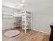 Bedroom with a desk, loft bed and ceiling fan at 4415 Charing Cross Rd, Sarasota, FL 34241