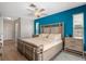 Bright main bedroom with an ample closet, ceiling fan and views of the outside at 4415 Charing Cross Rd, Sarasota, FL 34241