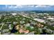 Expansive aerial view showcases a vibrant community with amenities amidst a sprawling landscape at 4505 45Th W Ave # 101B, Bradenton, FL 34210