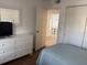 Bright bedroom with a view into other parts of the home, including a dining area at 4505 45Th W Ave # 101B, Bradenton, FL 34210