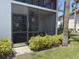 Enjoy the outdoors from this screened patio surrounded by manicured landscaping at 4505 45Th W Ave # 101B, Bradenton, FL 34210