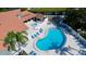 Inviting community pool and hot tub area, with lounge seating and well-maintained grounds at 4505 45Th W Ave # 101B, Bradenton, FL 34210
