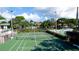 Overhead view of a well-maintained tennis court offers residents an active and enjoyable lifestyle at 4505 45Th W Ave # 101B, Bradenton, FL 34210