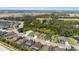 A scenic aerial shot highlights a neighborhood featuring homes surrounded by a nature preserve and bodies of water at 4515 Roycroft Ter, Parrish, FL 34219