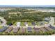 A high angle view of a quiet neighborhood featuring a mix of homes near green spaces and trees at 4515 Roycroft Ter, Parrish, FL 34219