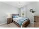 Bedroom features a bed, decorative lighting and wall decor at 4515 Roycroft Ter, Parrish, FL 34219