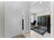 Inviting entryway features a sidelight window and leads to a home office/study at 4515 Roycroft Ter, Parrish, FL 34219
