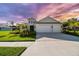 Charming single Gathering home with a wide driveway, two-car garage, and lovely lawn at 4515 Roycroft Ter, Parrish, FL 34219
