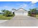 Inviting single-Gathering home with a spacious driveway, two-car garage, and vibrant landscaping at 4515 Roycroft Ter, Parrish, FL 34219