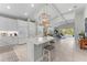 Spacious kitchen with an island, granite countertops, stainless appliances, and tile flooring at 4515 Roycroft Ter, Parrish, FL 34219