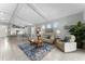 Bright living area with an open floor plan, tile floors, and a seamless flow throughout the home at 4515 Roycroft Ter, Parrish, FL 34219