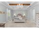 Bright main bedroom with natural light, a decorative chandelier, and neutral color palette at 4515 Roycroft Ter, Parrish, FL 34219