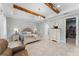 Charming main bedroom featuring beamed ceilings, chandelier and access to a large walk-in closet at 4515 Roycroft Ter, Parrish, FL 34219