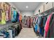Organized walk-in closet with ample shelving and hanging space for clothes, shoes, and accessories at 4515 Roycroft Ter, Parrish, FL 34219